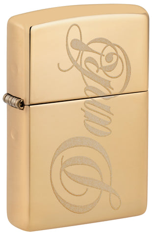 Front shot of ˫ Dank Design High Polish Brass Windproof Lighter standing at a 3/4 angle.